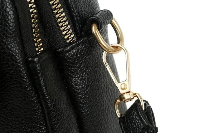 Chic women's retro style leather shoulder bag, a genuine leather vintage handbag ideal for elegant fashion.