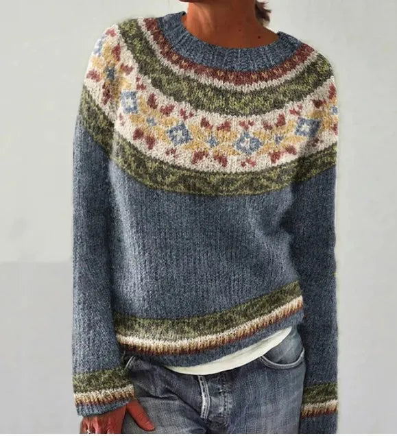 Relaxed fit women's pullover sweater featuring vibrant retro stripes.