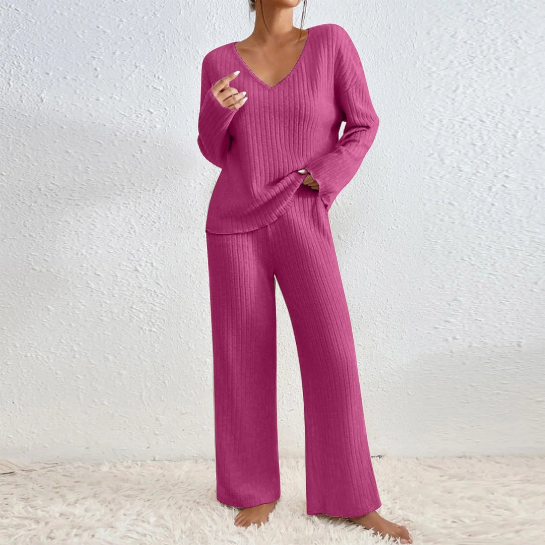 Women's cozy ribbed knit lounge set, V-neck top and wide-leg pants, ideal for home comfort.