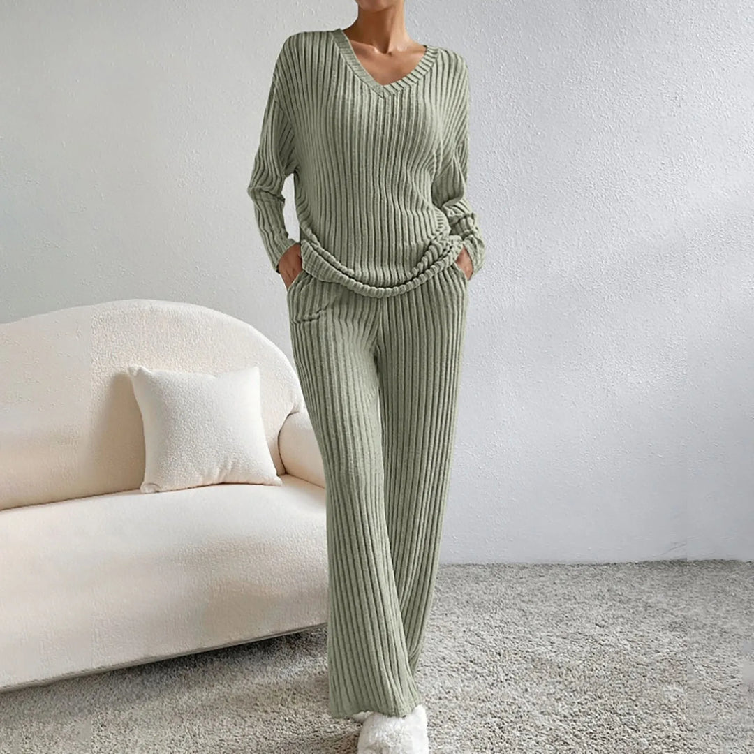 Stylish women's two-piece ribbed knit lounge set with a flattering V-neck top & comfortable wide-leg pants.
