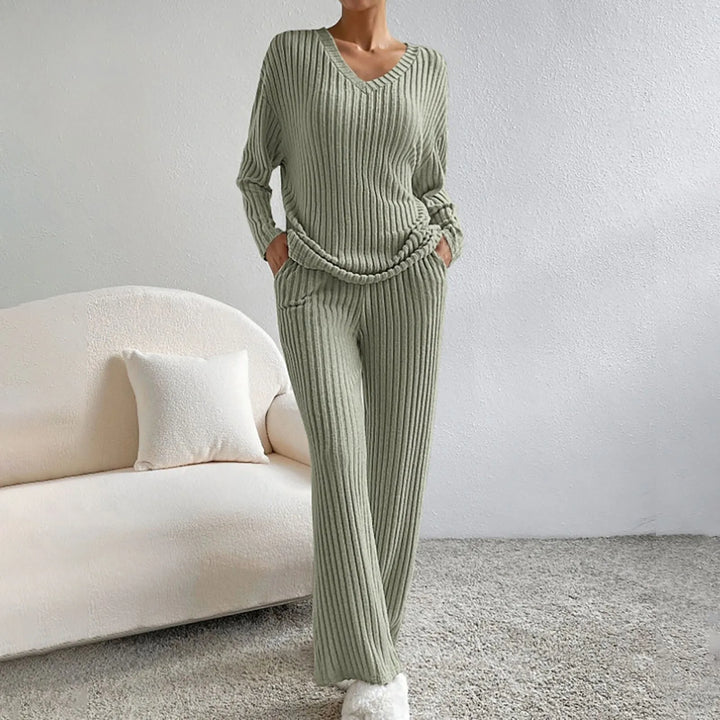 Stylish women's two-piece ribbed knit lounge set with a flattering V-neck top & comfortable wide-leg pants.