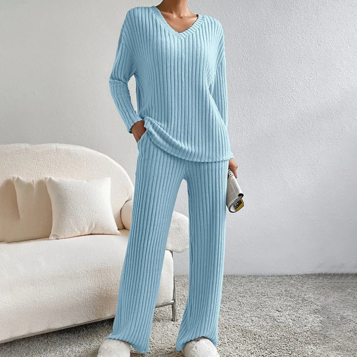 Textured ribbed knit women's lounge set, a comfortable two-piece outfit with V-neck & wide-leg design.