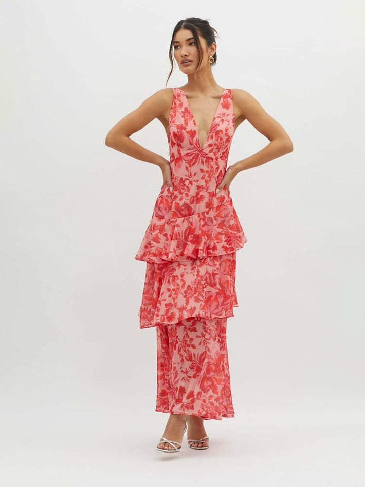 Stylish women's summer midi dress in floral print with ruffles & a unique strappy back. Great for resort wear.