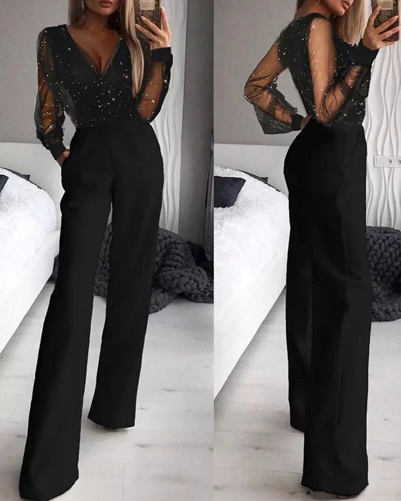 Women's shimmering black glitter jumpsuit, perfect for dazzling party outfits & elegant evening wear. Glamorous sparkle.