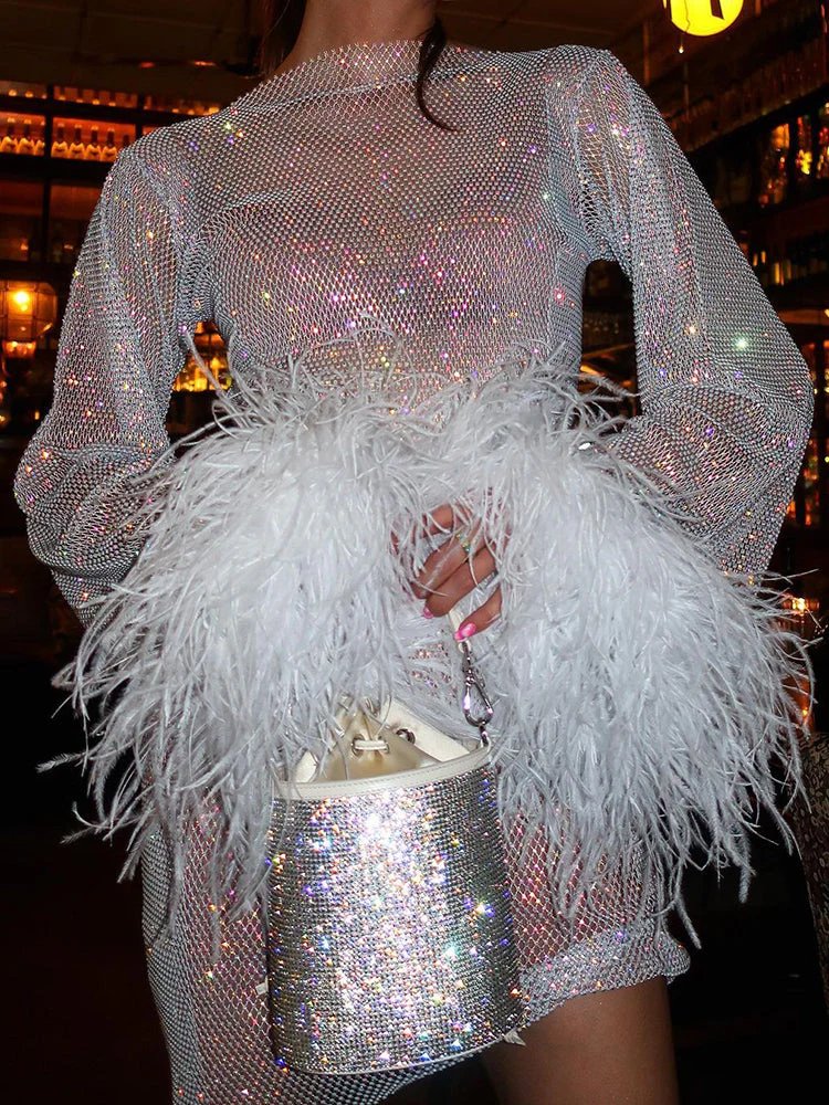 Women's stunning metallic mini cocktail dress with a beautiful shimmer, perfect for a memorable night out.
