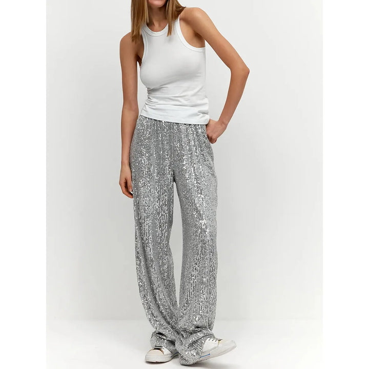 Women's shimmering sequin trousers, perfect for festive parties & evening wear. High-waisted wide-leg design.