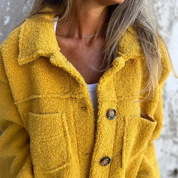Stylish women's teddy jacket with soft texture and chic lapel collar, perfect for casual outerwear.