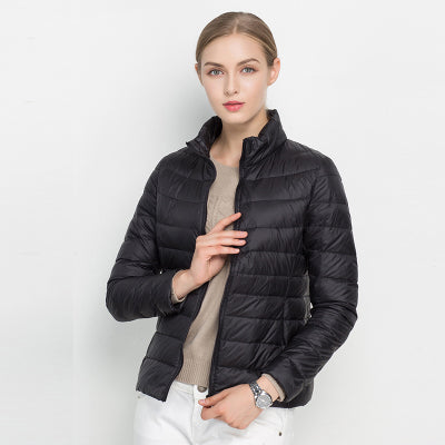 Casual yet sleek women's zip-up puffer jacket, featuring a chic quilted pattern & stand collar for fall fashion.