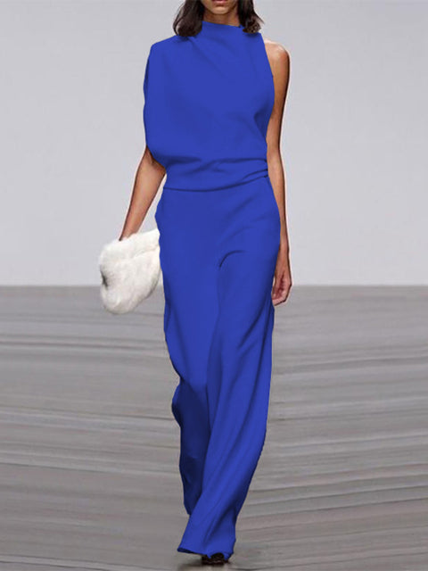 Side profile of women's elegant sleeveless wide-leg jumpsuit, showcasing its flattering one-piece silhouette.