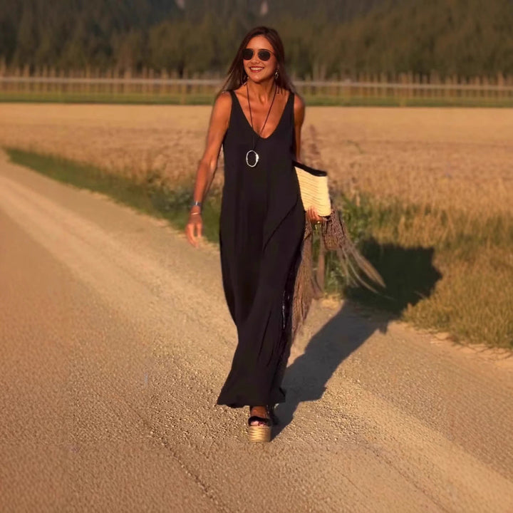 Elegant solid color sleeveless maxi dress, perfect for women's resort wear and vacations.
