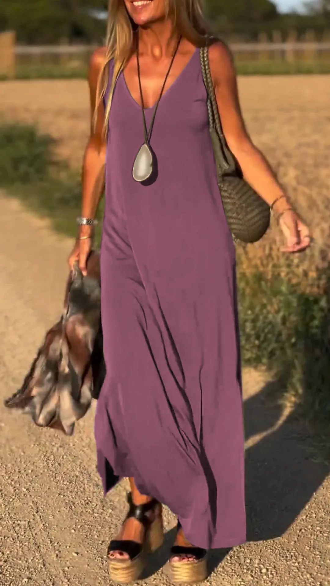 Chic solid sleeveless maxi dress for women, offering a blend of comfort and modern elegance.