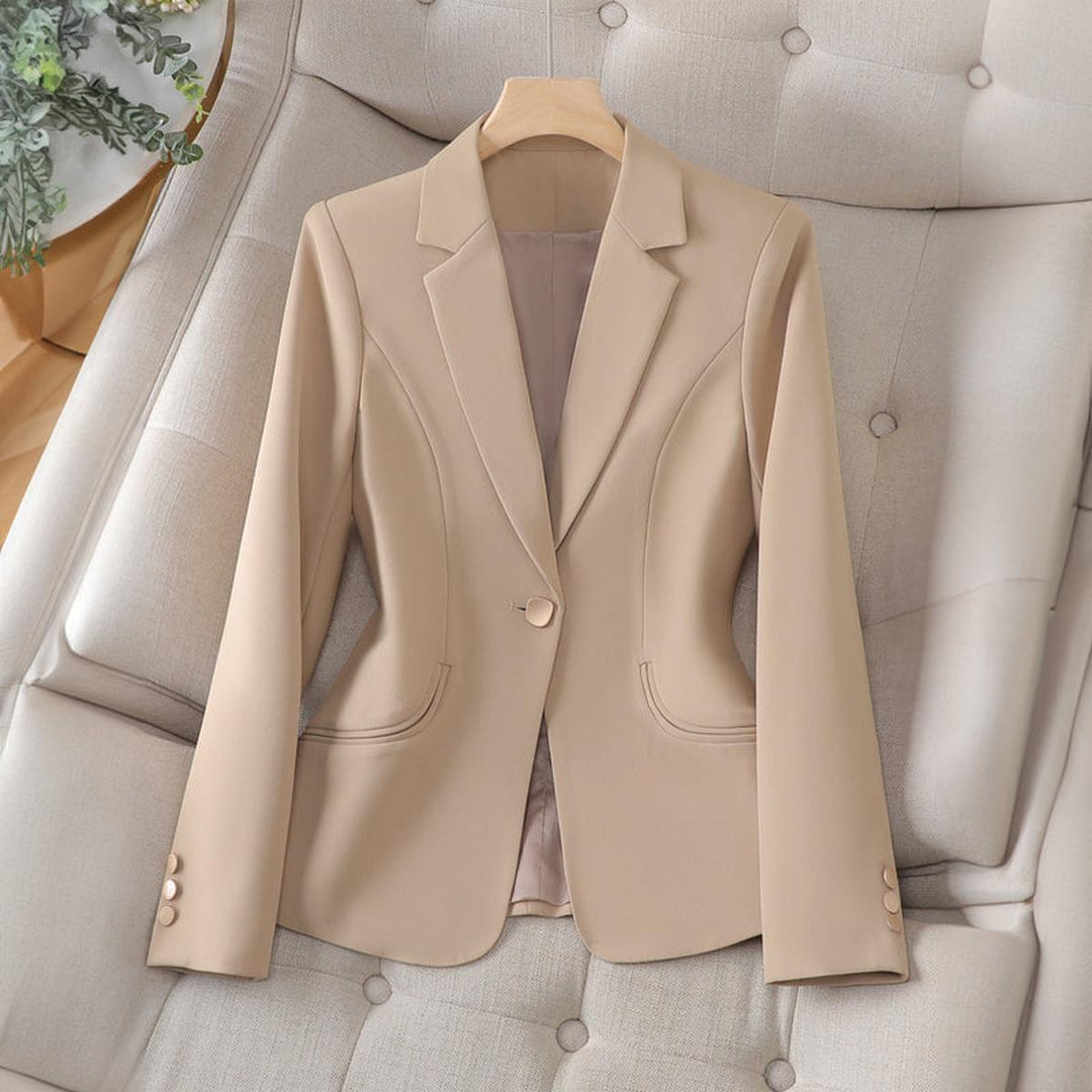 Chic women's lapel collar blazer, slim fit with single-button closure. Modern and elegant for office and daily wear.