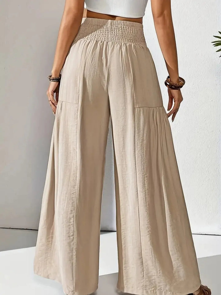 Comfortable women's wide leg trousers, smocked waist, relaxed fit for everyday & summer fashion.