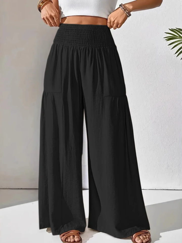 Women's high waist wide leg pants, featuring a comfy smocked waist, great for flowy casual style.