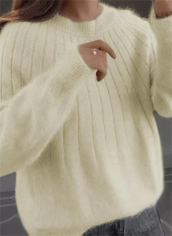 Chic women's Sofie knit sweater, a cozy long sleeve cashmere jumper for elegant fall and winter fashion.