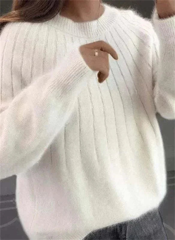 Cozy women's long sleeve cashmere knit sweater, the Sofie jumper offers luxurious warmth for fall & winter.