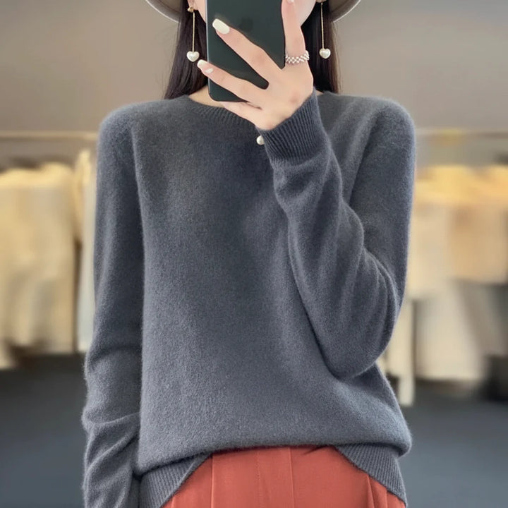 Classic women's crewneck pullover sweater, soft & warm for cozy autumn and winter fashion.