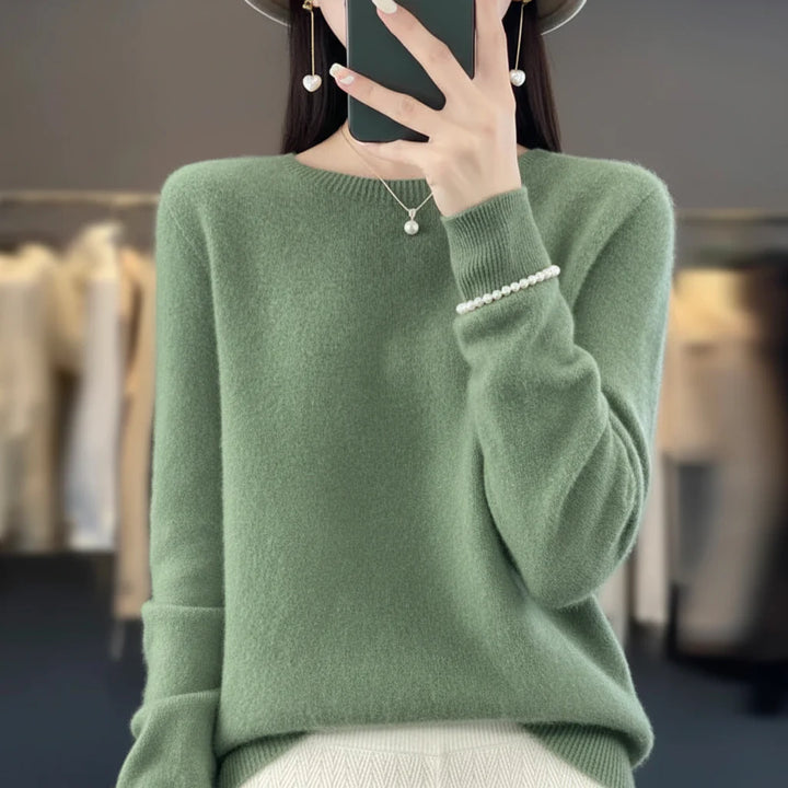 Comfy women's warm sweater, a long-sleeve crewneck pullover for cozy winter fashion.