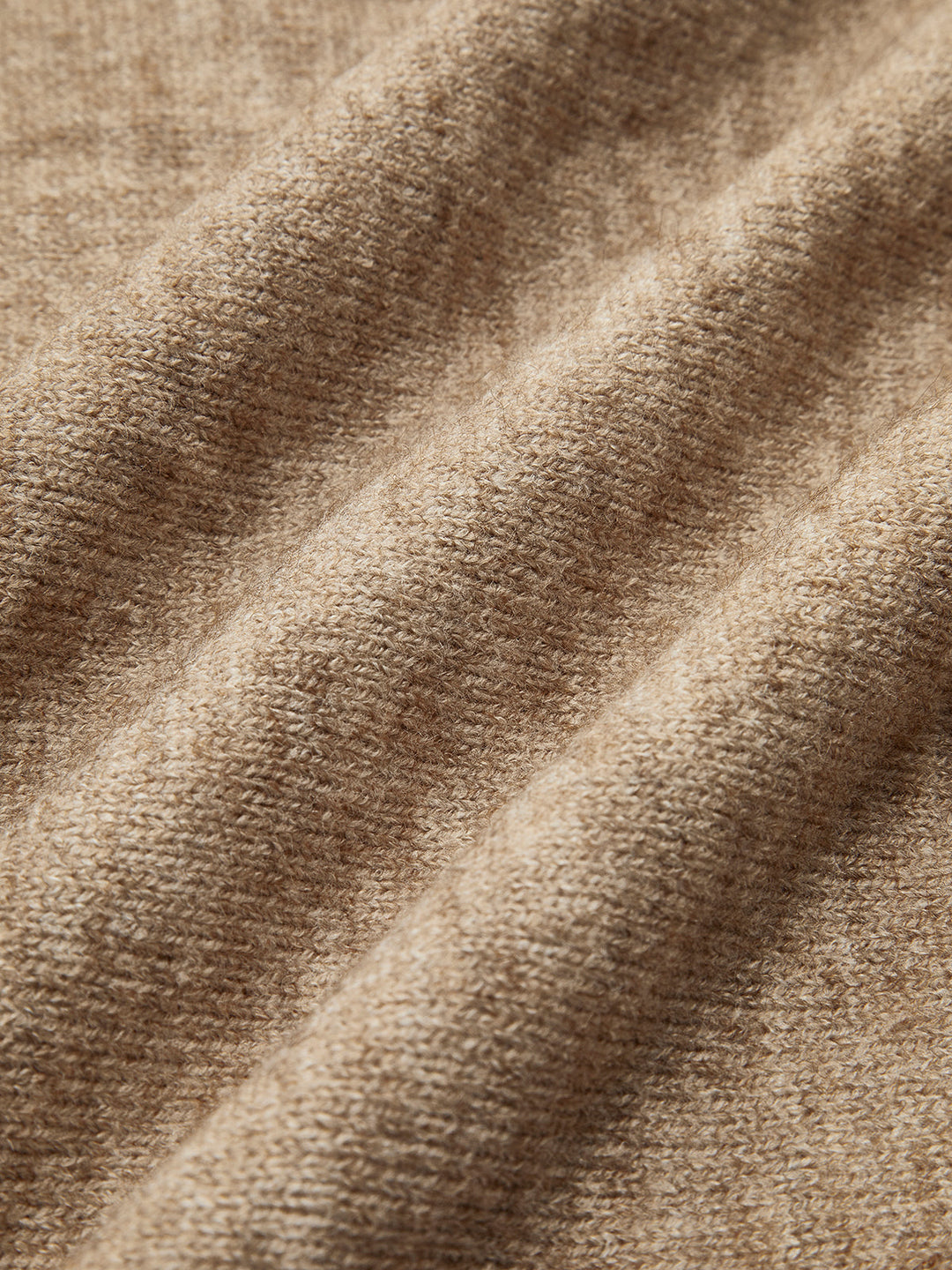 Luxurious soft knit matching lounge set for women, featuring a turtleneck and wide-leg pants.