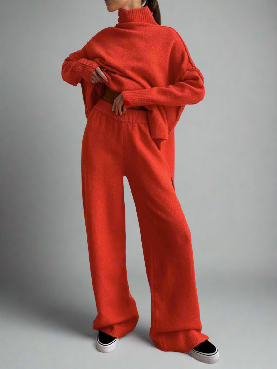 Complete women's matching knit lounge set: soft turtleneck top & wide-leg pants for cozy comfort.