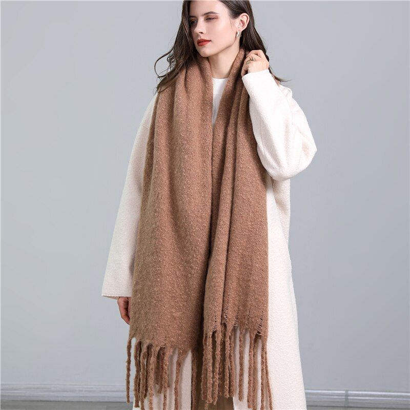 Chic women's plaid cashmere scarf, perfect fashion accessory for winter.