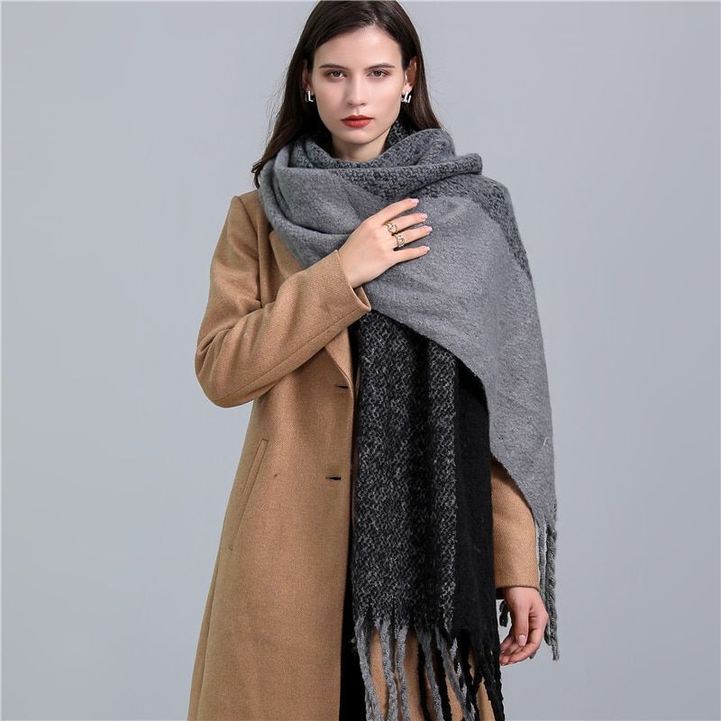 Luxurious women's plaid cashmere scarf, soft and comfortable for cold days.