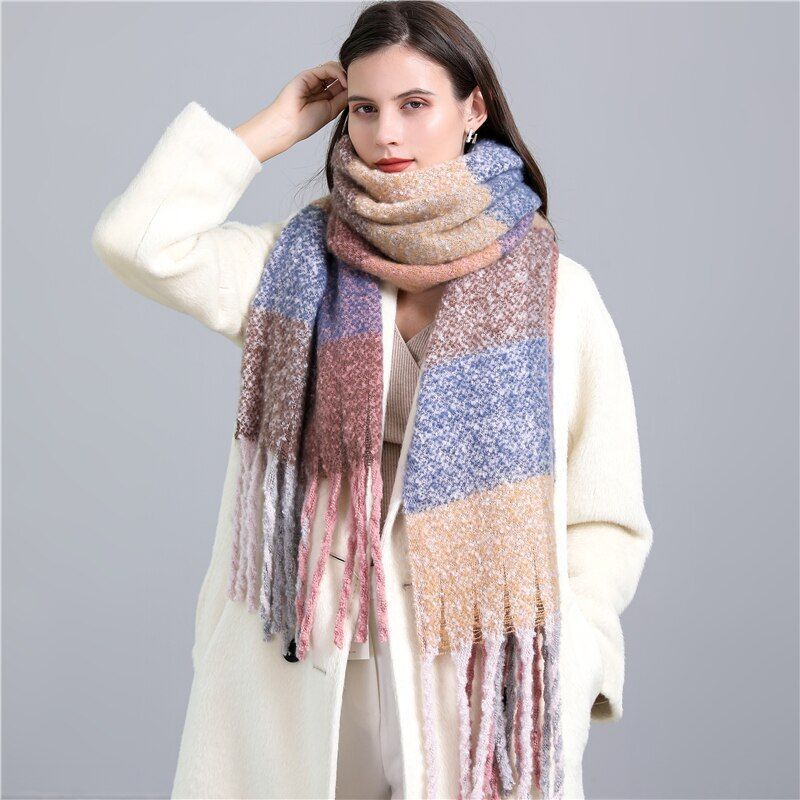Stylish women's plaid cashmere scarf, a versatile fashion accessory for cold weather.