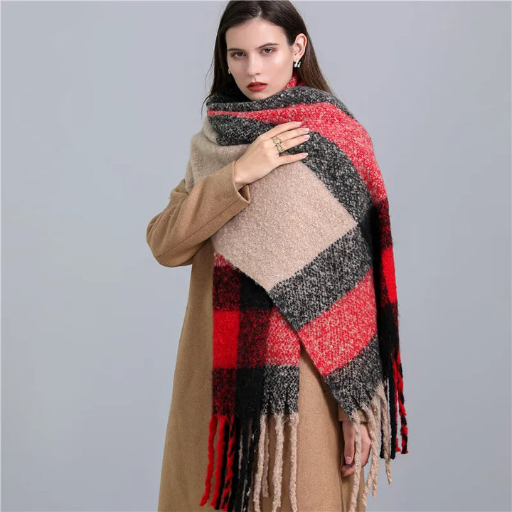 Soft women's luxury cashmere scarf, featuring a classic plaid design for winter.