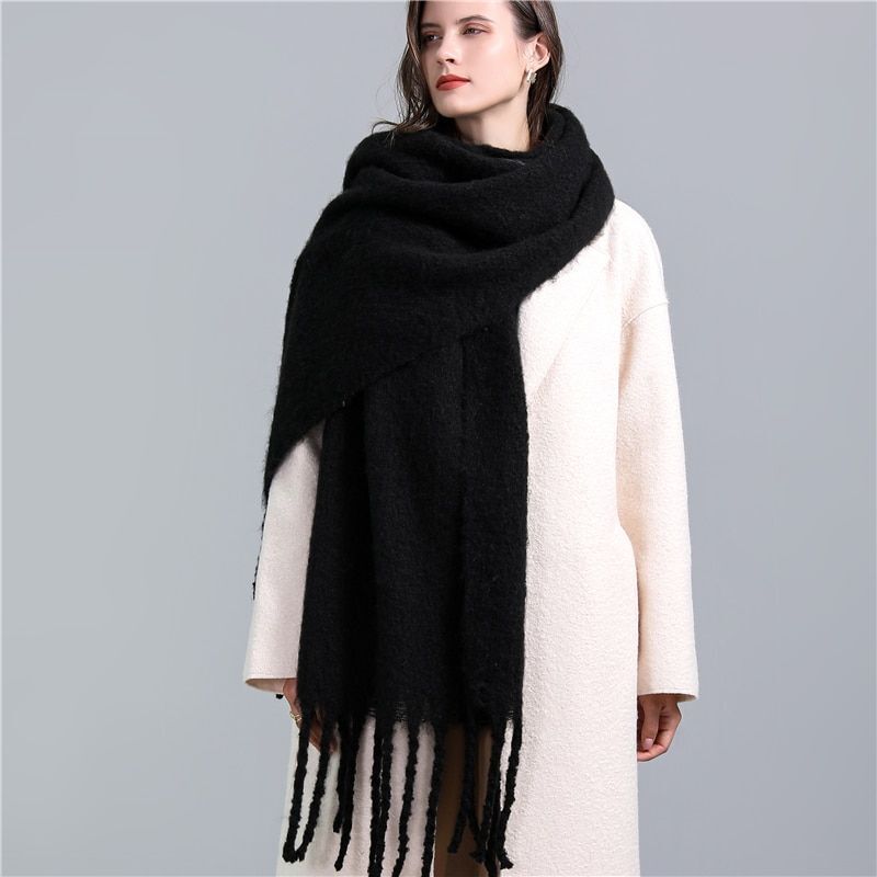 Stylish checked cashmere scarf for women, soft and cozy winter fashion.