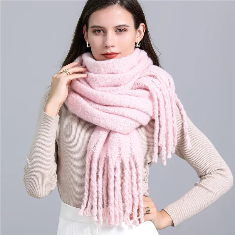 Elegant women's cashmere scarf, plaid design for sophisticated winter fashion.