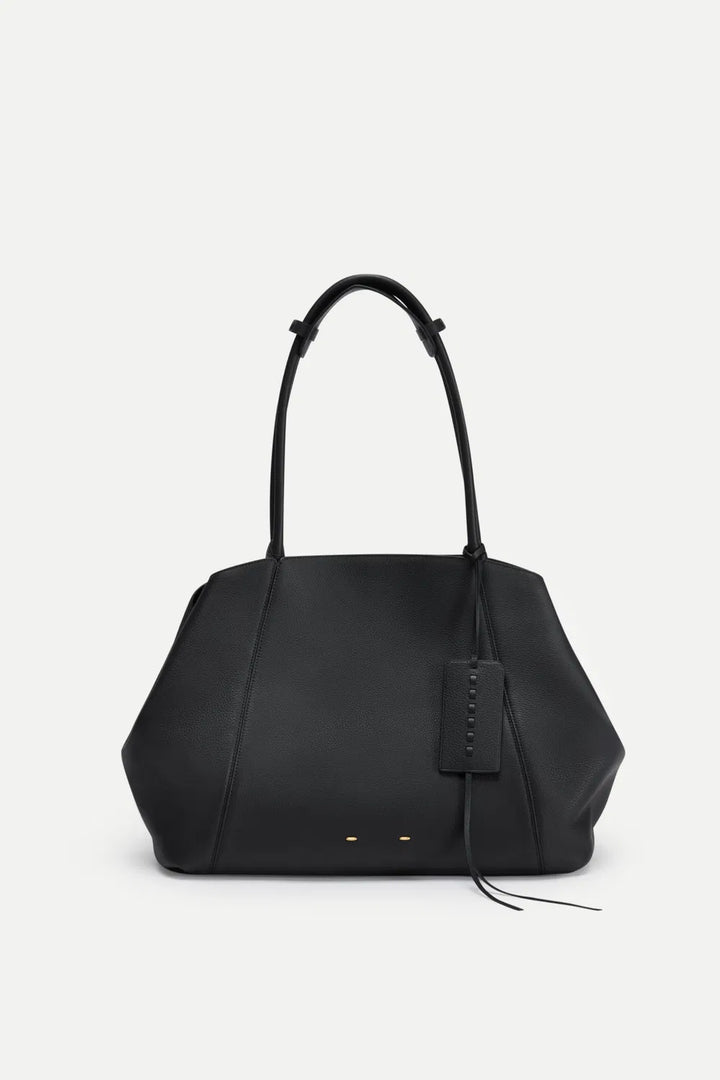 Large versatile women's handbag tote, perfect as a travel shoulder bag.