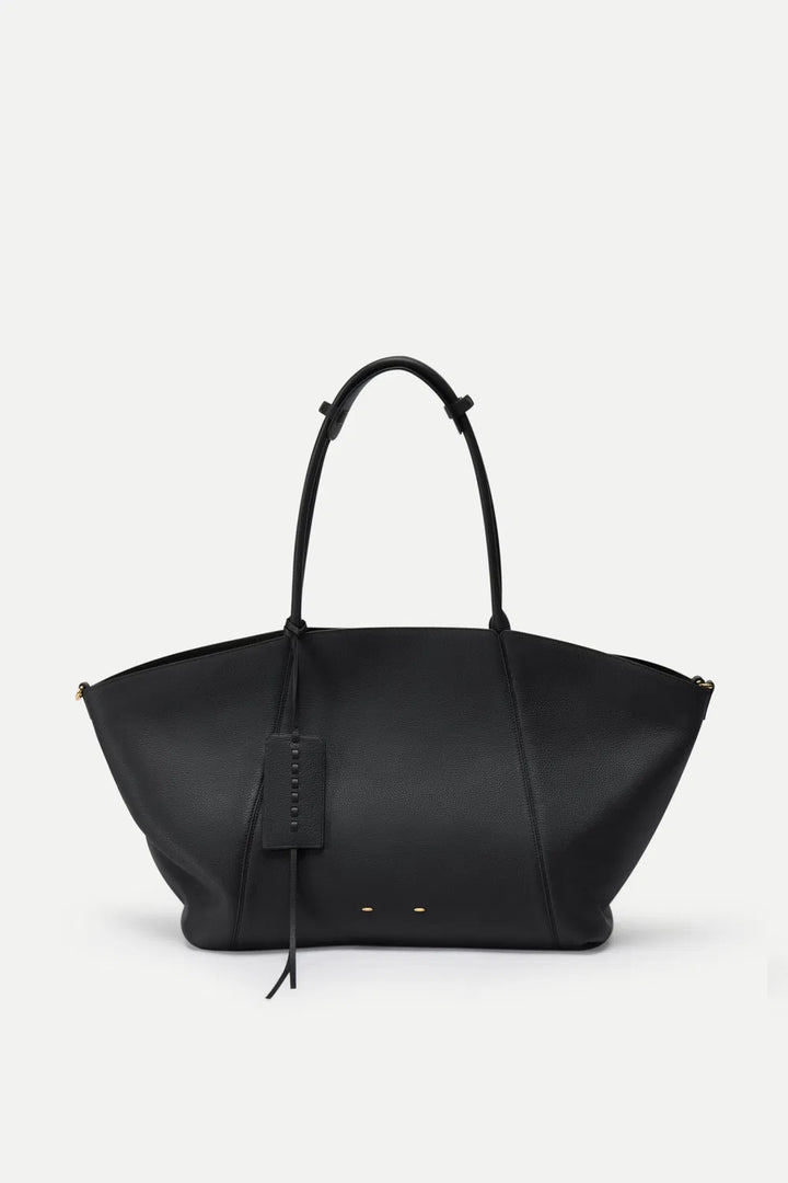 Brown travel tote bag for women, large & spacious for all your journeys.