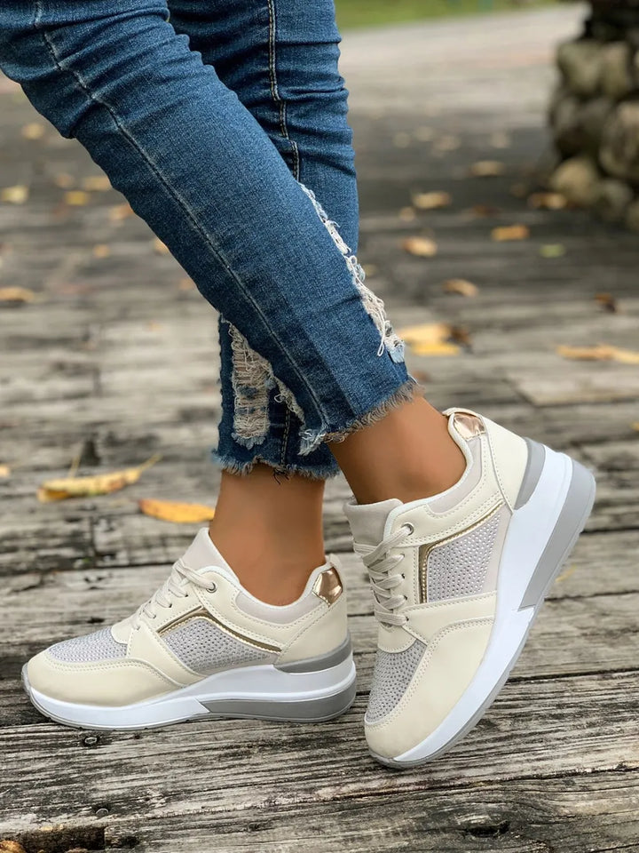 Comfortable women's sparkling platform sneakers, versatile for casual and trendy everyday wear.