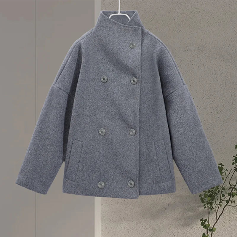 Cozy women's stand collar pea coat, essential outerwear for crisp fall weather.