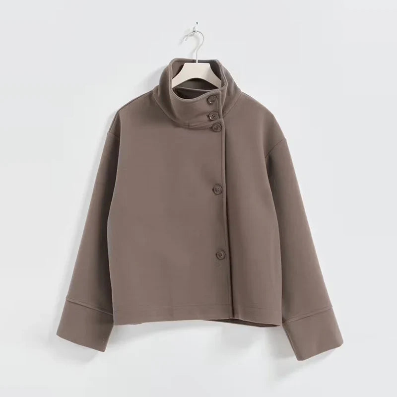 Modern women's pea coat, featuring a stand collar for a sophisticated winter look.