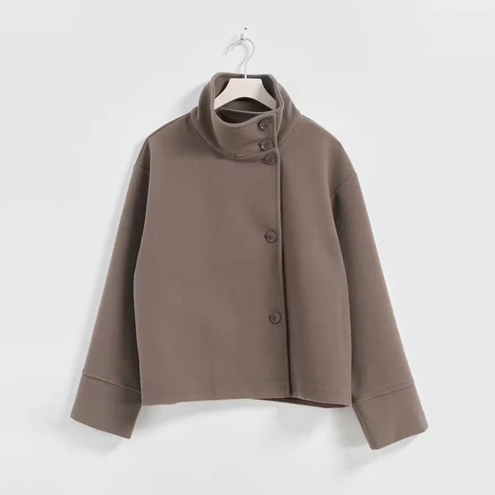 Modern women's pea coat, featuring a stand collar for a sophisticated winter look.