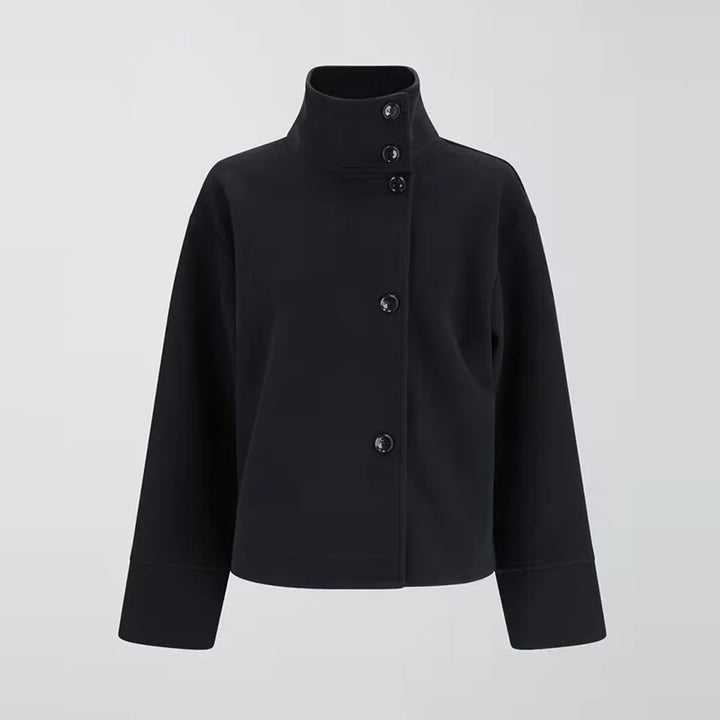 Women's elegant pea coat with stand collar, a classic fall fashion outerwear choice.