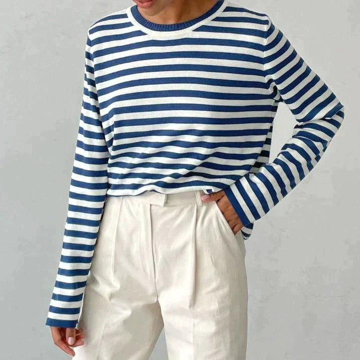 Comfortable women's relaxed fit striped knit sweater, a chic long sleeve crewneck for everyday fashion.