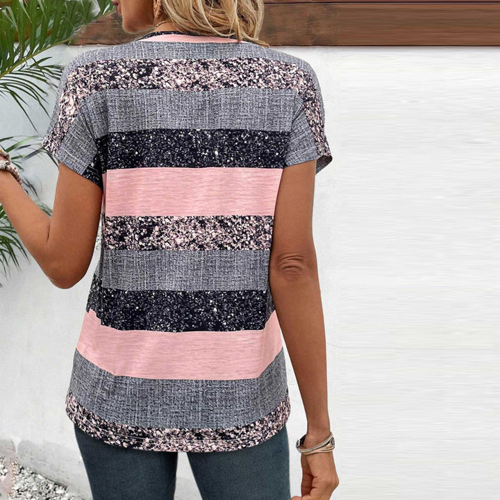 Chic women's striped button-front short sleeve top for versatile summer fashion. Casual everyday t-shirt with a relaxed fit.
