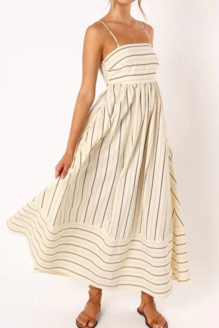 Comfortable women's striped strappy maxi dress, great for summer beach days.