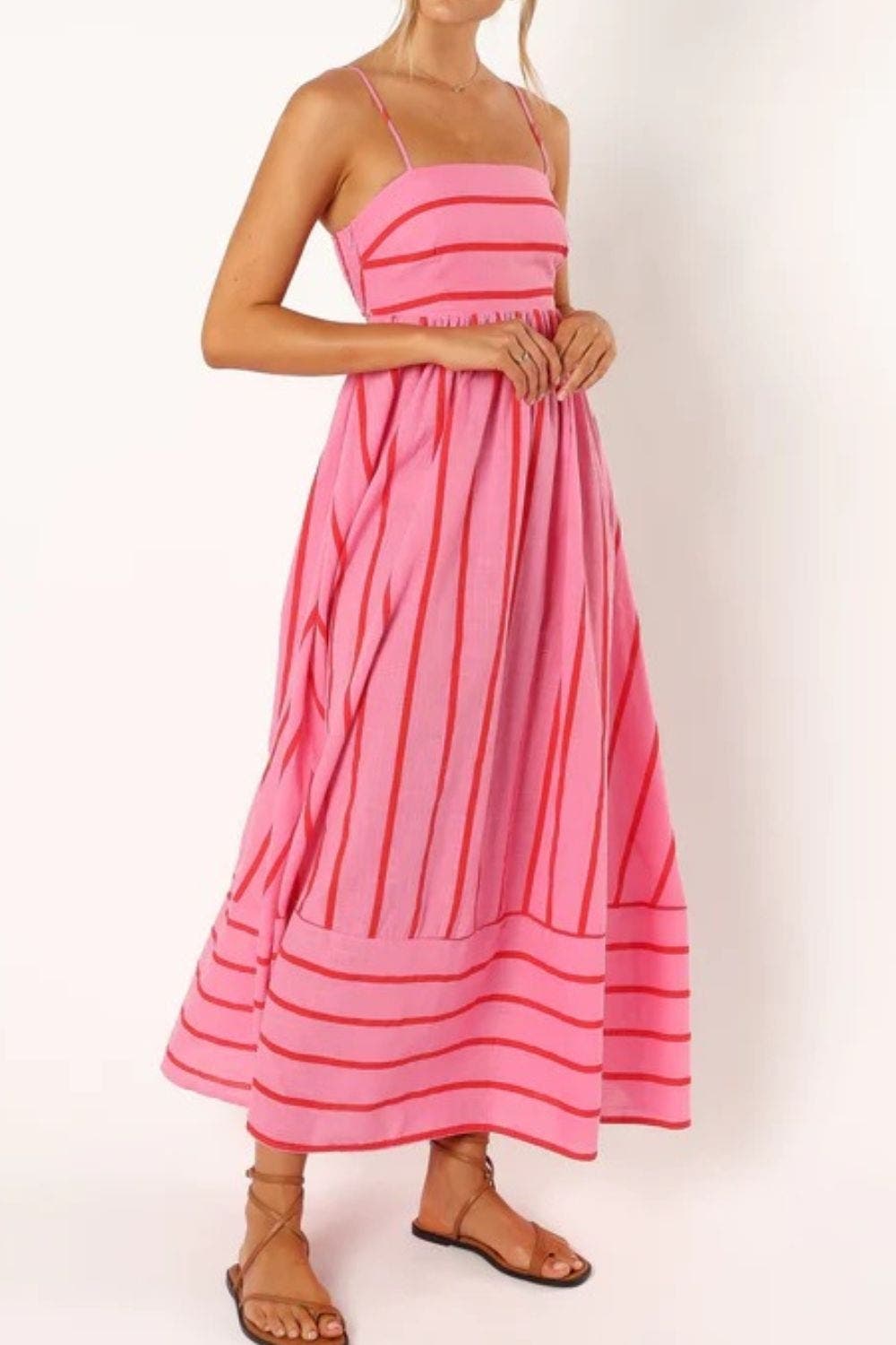 Sleeveless striped beach maxi dress for women, comfortable & stylish for vacation.