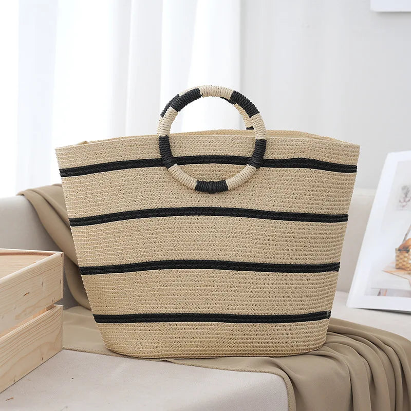 Women's striped woven beach tote bag, perfect for summer outings and carrying essentials.