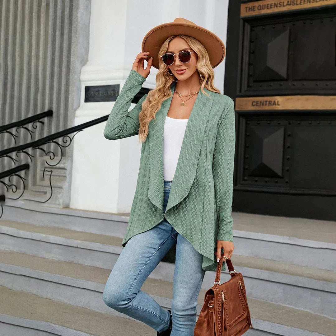 Chic women's knit cardigan, cozy and versatile for autumn fashion layering.