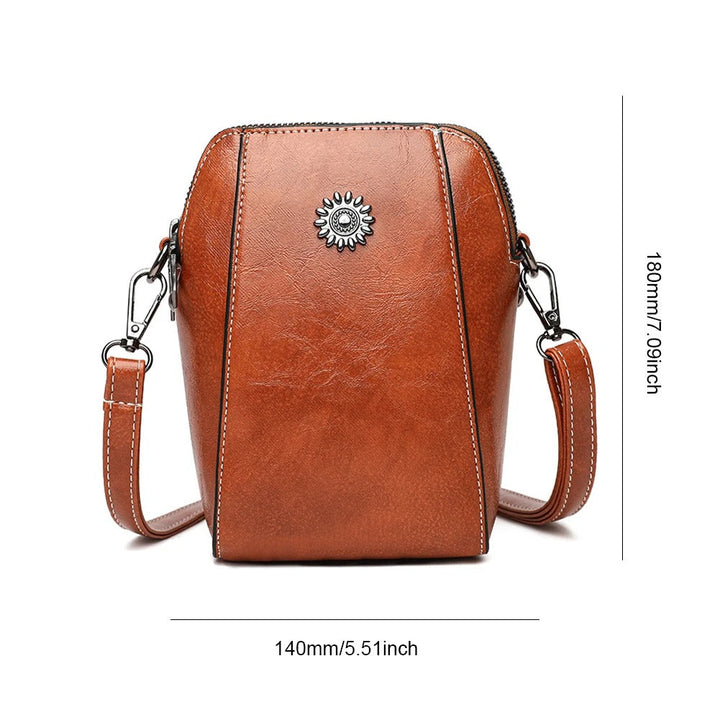 Versatile women's red leather shoulder bag, a stylish and functional everyday accessory with adjustable strap.