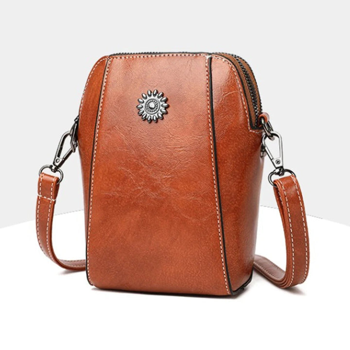 Premium green leather shoulder bag for women, offering style, versatility, and an adjustable strap.