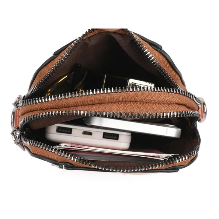 Chic black leather shoulder bag for women, versatile and fashionable, ideal for any occasion.