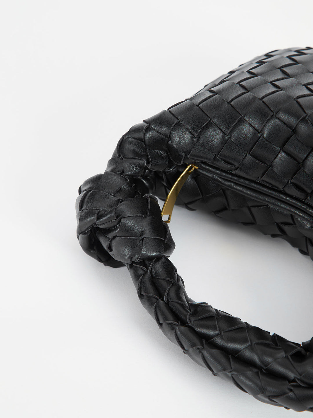Stylish braided handbag for women, featuring a trendy knot handle and textured finish.