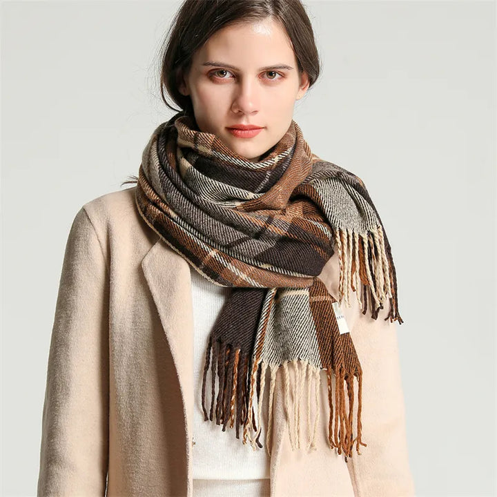 Elegant women's knitted cashmere scarf with a timeless checkered pattern, a versatile winter accessory.