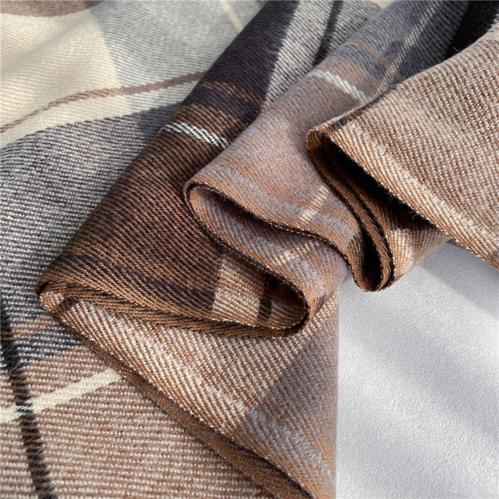 Warm and soft cashmere knitted scarf for women, featuring a stylish checkered design. Winter essential.