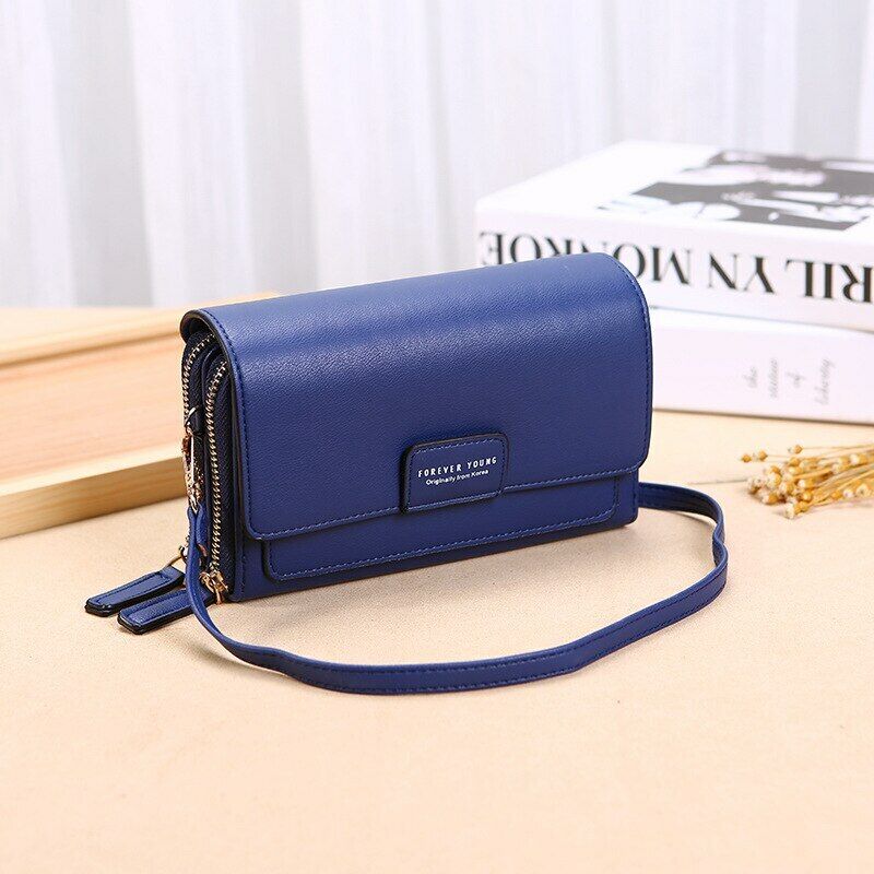 Fashionable faux leather shoulder bag with a built-in women's wallet, a versatile accessory.